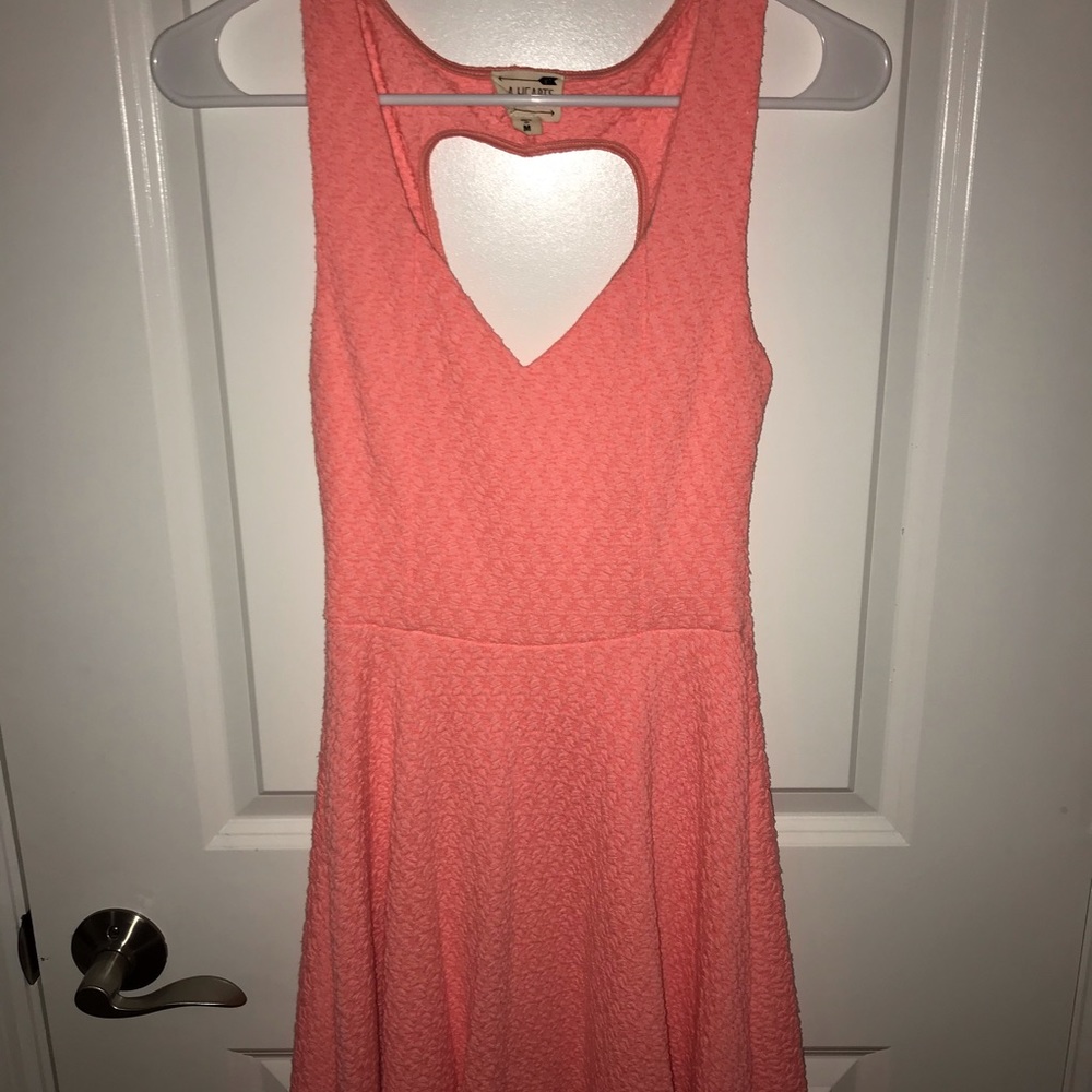 Hot pink skater dress with heart shaped back